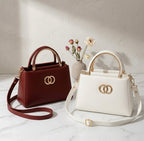 Elegant Dual Ring Top Handle Handbag